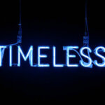 a blue neon sign with wires / Zeitmanagement